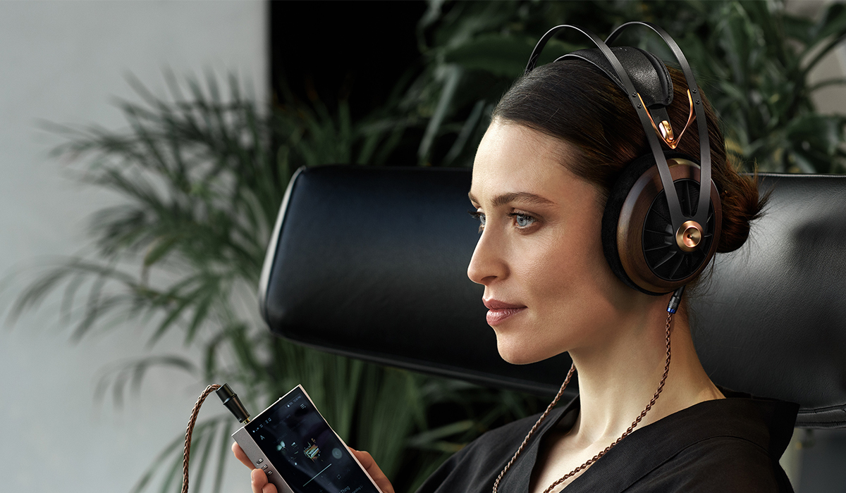 Woman listening music Meze Audio 109 Pro headphones portable hifi loud and clear glasgow scotland