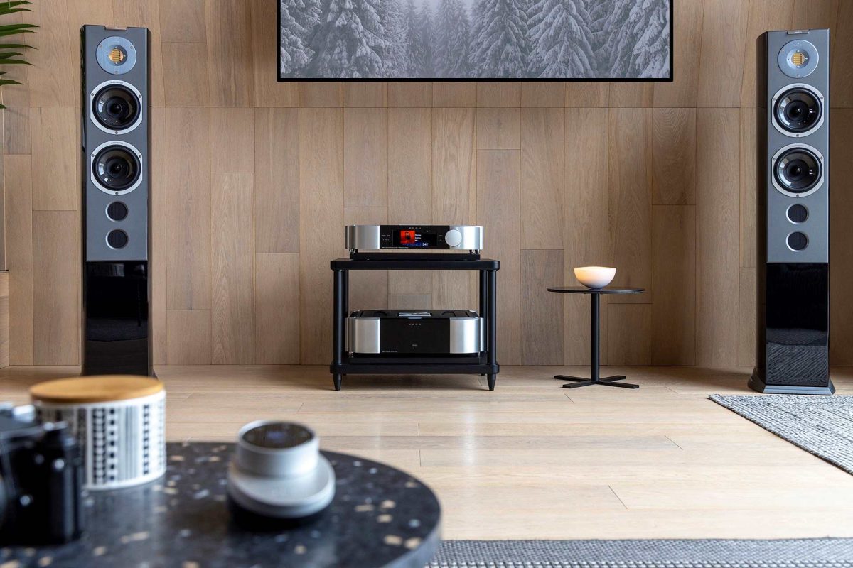 lifestyle image of moon north collection - 791 streaming preamplifier and 761 power amplifier with audiovector r 6 arrete floorstanding speakers, high-end audio from loud and clear hi-fi, glasgow, scotland, uk