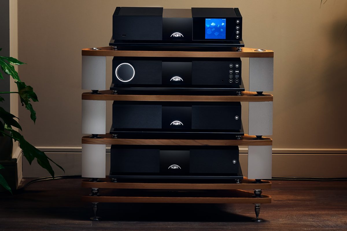 Naim audio New Classic 300 series with nss 333 streamer, nac332 preamp, nap 350 mono power amplifiers on fraim equipment rack with plant in corner high-end hi-fi from loud and clear glasgow, scotland, uk