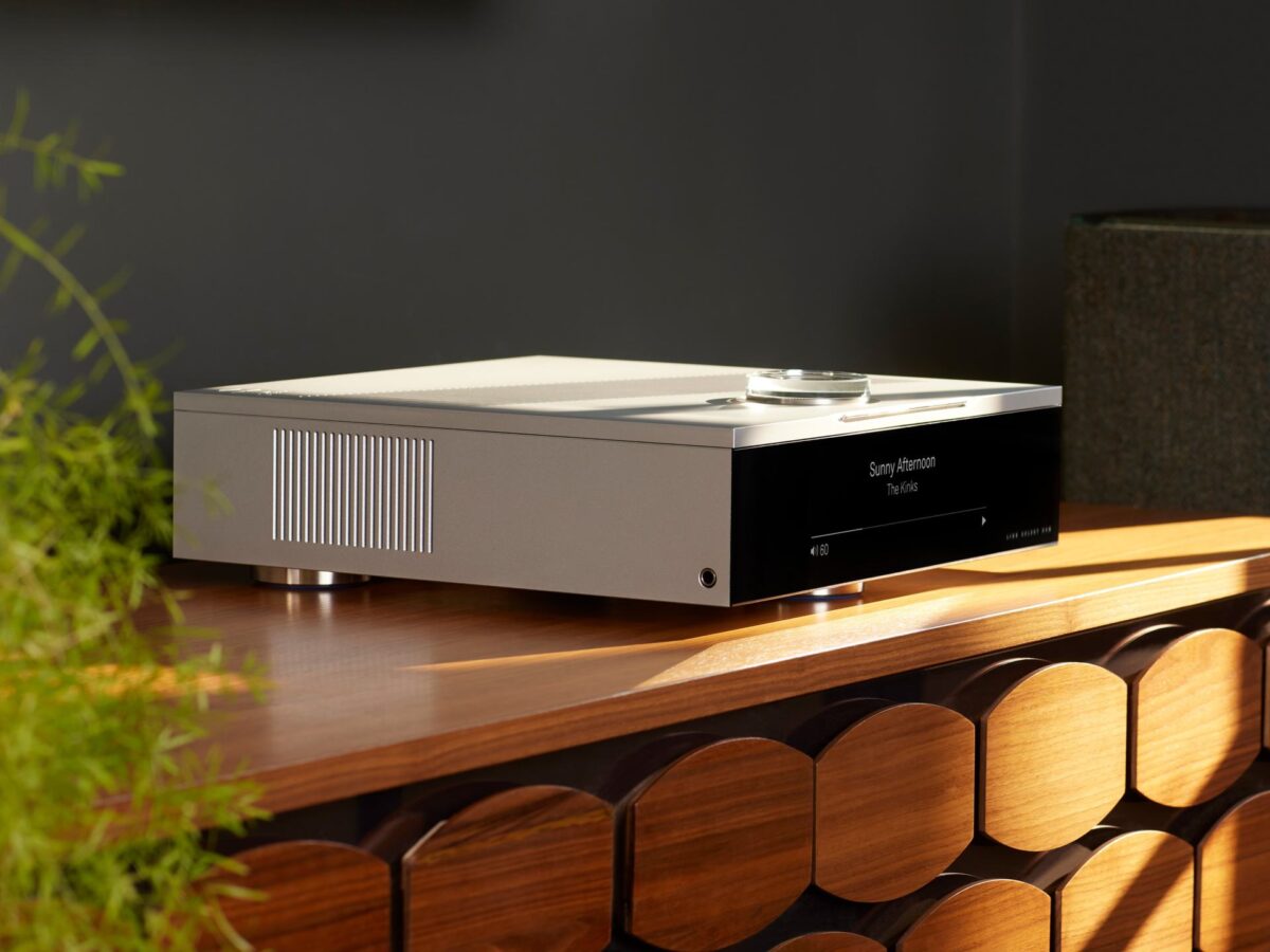 linn selekt dsm edition hub digital streaming amplifier with organik dac on wooden sideboard and green plant on the left, high-end hi-fi from loud and clear glasgow, scotland, uk